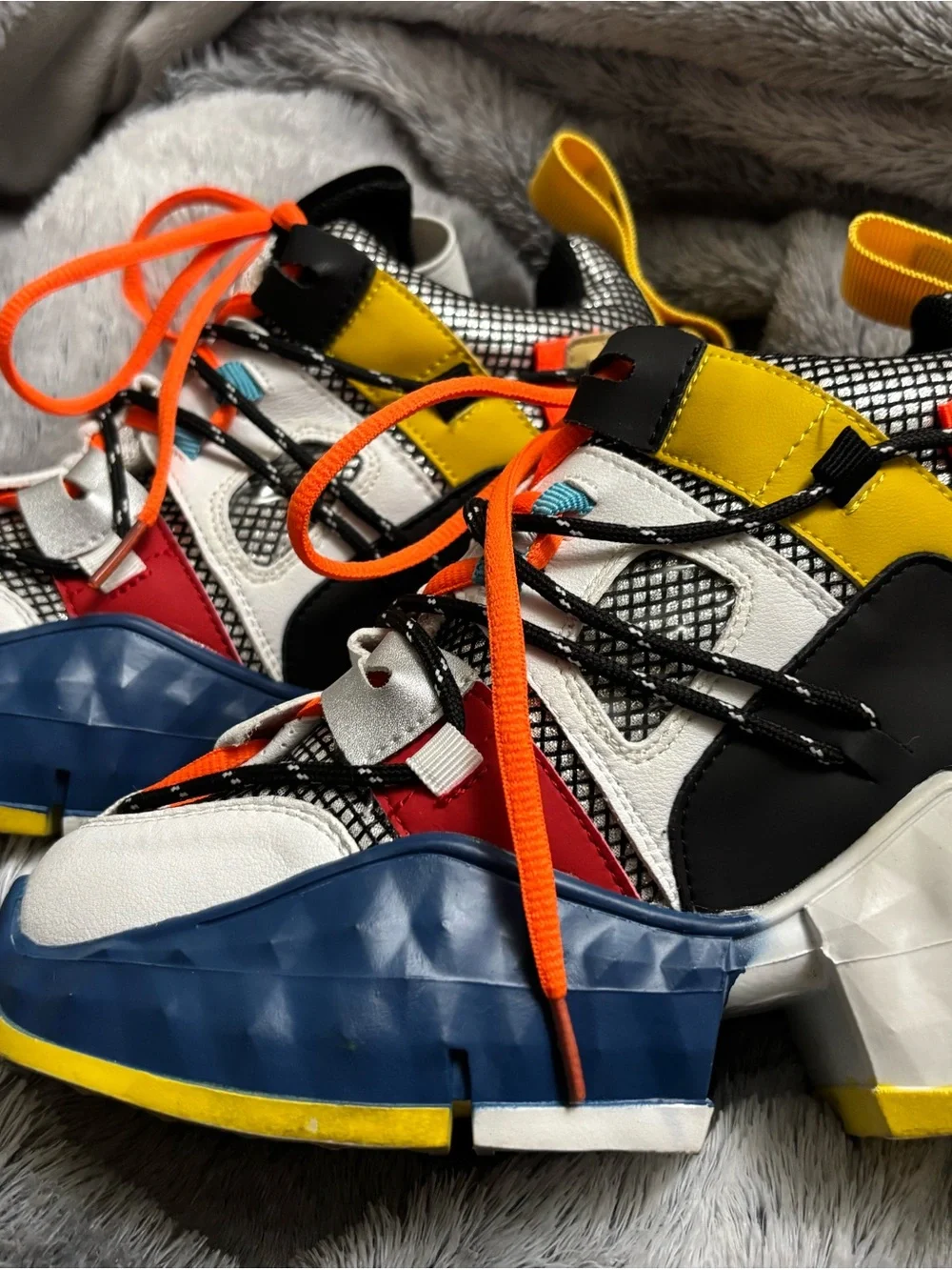 Youth White Sneakers with Blue & Yellow Soles and Orange Laces